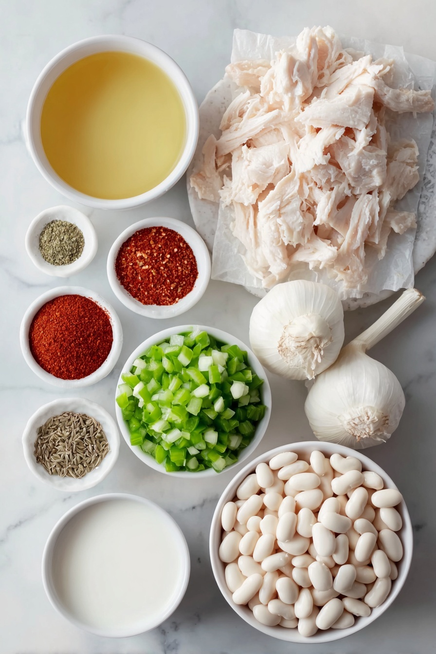 Creamy White Chicken Chili, White Chicken Chili recipe, easy chicken chili, comforting chicken chili, homemade white chili - Flat lay of a small pool of golden olive oil in a simple white ceramic bowl, a mound of freshly chopped white onion, a few vibrant green chopped jalapeño halves, three whole unpeeled garlic cloves, a neat pile of shredded white chicken breast, a small white bowl filled with pale golden chicken broth, a small white bowl with creamy white milk, a small white bowl holding thick heavy whipping cream, a simple white ceramic bowl heaped with plump white beans, a small white bowl containing bright green diced chilies, small white bowls arranged with ground brown cumin, fine white salt, reddish paprika powder, cayenne powder with a deep red hue, dried green oregano leaves, and a simple white bowl of smooth sour cream, all evenly spaced and symmetrically placed on a clean white marble surface, soft natural light, photo taken with an iPhone, professional food photography style, fresh ingredients, white ceramic bowls, no bottles, no duplicates, no utensils, no packaging --ar 2:3 --v 7 --p m7354615311229779997